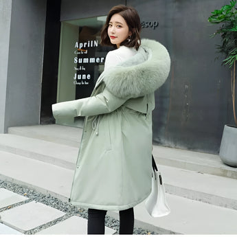 Luxurious oversized green fur hooded coat with long sleeves, designed for winter fashion, shown in a 4XL size.