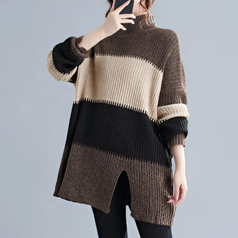 Oversized striped turtleneck sweater dress with chunky knit design, showcasing long sleeves and a relaxed fit suitable for winter fashion.