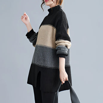 Oversized turtleneck striped sweater dress featuring a chunky knit design, showcasing long sleeves and a loose fit covering the shoulders and extending to the knees, perfect for winter fashion.
