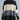 Oversized turtleneck striped sweater dress in chunky knit fabric featuring black and white stripes, showcasing winter fashion style.