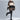 Oversized brown turtleneck striped sweater dress in chunky knit, showcasing a cozy winter fashion style, worn by a person with visible legs and partial accessories like eyewear.