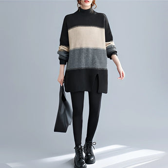 Oversized turtleneck striped sweater dress in chunky knit design, showcasing a cozy winter fashion style with long sleeves and a relaxed fit.