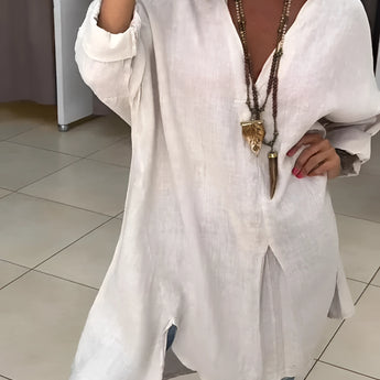 Oversized white linen blouse with long sleeves, featuring a relaxed bohemian style and a collar, shown in a sand color and size 3XL.