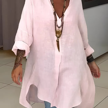 Oversized pink linen blouse with a casual chic bohemian style, featuring a collar, long sleeves, and a loose fit for a comfortable summer look.
