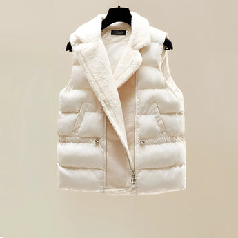 Oversized white turtleneck sweater in a cozy ribbed knit fabric, featuring long sleeves and a high collar, perfect for winter wear.