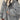 Oversized women's gray bomber puffer jacket in size 2XL, featuring a large collar, long sleeves, and a stylish waist-length design, perfect for trendy winter fashion.