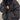 Oversized women's black bomber puffer jacket in a 2XL size, featuring a high collar, long sleeves, and a trendy winter fashion design. The jacket has a sleek and modern look, perfect for cold weather.
