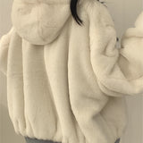 Oversized women's black bomber puffer jacket with a warm, trendy design, featuring a comfortable fit and long sleeves.