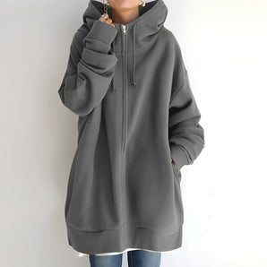 Oversized women's gray zip-up hoodie in size 5XL, featuring a comfortable design with a prominent collar, long sleeves, and a soft, cozy material suitable for winter wear.