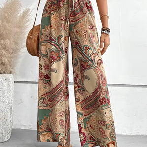 Bohemian wide-leg palazzo pants with a paisley print in cachi color, suitable for summer wear, shown in size 2XL.