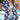Blue palm tree print women's lightweight beach shirt with short sleeves, suitable for resort wear, shown in size 2XL.