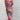 
A sleeveless midi dress in pastel gradient colors, primarily pink, with a ruched design. The dress is worn by a human model, showcasing the neckline, waist, and length extending to the knees, suitable for chic summer wear.