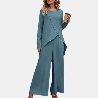 Pastel yellow linen loungewear set for women, featuring a relaxed fit with a button-up shirt having a collar and long sleeves, paired with comfortable pants.