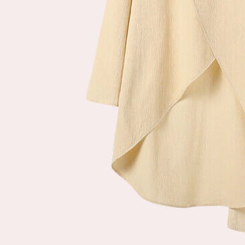 Pastel yellow linen loungewear set for women, featuring a soft and comfortable pajama design with button-down front, long sleeves, and a classic collar.