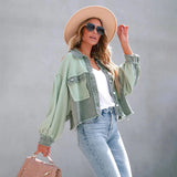 
A stylish summer outfit featuring a peach lace blouse paired with acid wash jeans and white sneakers. The ensemble is accessorized with sunglasses and a chic fedora hat, embodying a casual yet fashionable look.