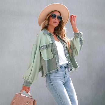 
A stylish summer outfit featuring a peach lace blouse paired with acid wash jeans and white sneakers. The ensemble is accessorized with sunglasses and a chic fedora hat, embodying a casual yet fashionable look.