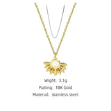 Designer gold floral pendant necklace with pearl centerpiece by YA-CHAN, featuring an intricate chain and stylish fashion accessory design.