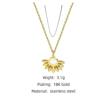 Designer gold floral pendant necklace with pearl centerpiece by YA-CHAN, featuring an intricate chain and stylish fashion accessory design.