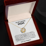 Personalized heart-shaped silver necklace displayed in a rectangular jewelry box with elegant font engraving, ideal Mother’s Day gift from daughter.