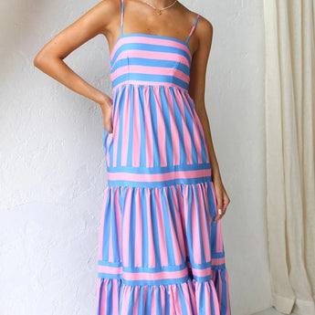 Pink and blue striped maxi dress with spaghetti straps, designed as a summer beach dress.