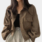 A brown cropped V-neck blouse with puffed sleeves, designed for a casual chic look, shown in an XL size.