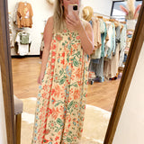 Pink floral bohemian wide-leg jumpsuit with pockets, featuring a yellow color scheme, suitable for formal and casual occasions, in 4XL/5XL size. The jumpsuit includes a relaxed fit with a defined waist and stylish wide sleeves.