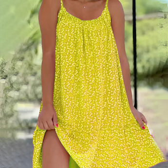 Yellow sleeveless midi dress with floral design, featuring an A-line silhouette and knee-length hem, ideal for resort wear.