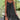 
A black sleeveless midi dress featuring a floral design, worn by a model, showcasing its A-line silhouette.