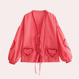 Pink gingham puff sleeve blouse with ruffle trim, featuring a red color and XL size, showcasing a tartan pattern with a collar and stylish details suitable for spring fashion.