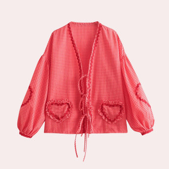Pink gingham puff sleeve blouse with ruffle trim, featuring a red color and XL size, showcasing a tartan pattern with a collar and stylish details suitable for spring fashion.
