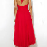 Pink halter neck backless tulle dress designed for weddings and summer events, featuring a delicate one-piece garment with a flattering waistline, sleeveless design, and elegant neckline.