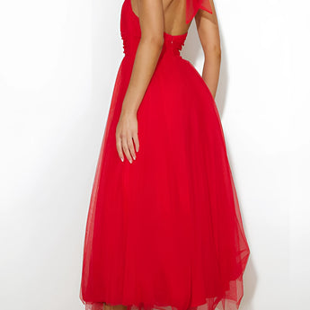 Pink halter neck backless tulle dress with a flowing skirt, perfect for weddings and summer events, showcasing elegant design elements like a fitted waist and thigh-length hemline.