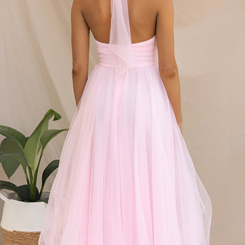 Pink halter neck backless tulle dress designed for weddings and summer events, featuring a flowing silhouette and elegant style.