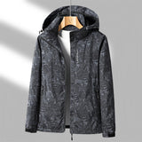 A black 4XL lightweight moisture-wicking athletic wear fabric displayed on a clothes hanger, featuring a sleek design suitable for outerwear, with elements like sleeves and a collar.