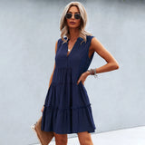 
A sleeveless marine blue mini dress with a V-neck and tiered design, suitable for summer fashion.