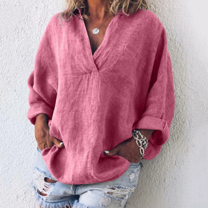 Pink oversized V-neck linen blouse for women, featuring a relaxed fit with long sleeves, shown in a rose color and size XL.