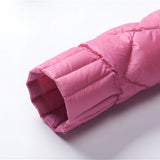 Pink women's diamond pattern lightweight quilted jacket with a stylish and comfortable design, showcasing a magenta hue and intricate diamond stitching.