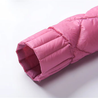 Pink women's diamond pattern lightweight quilted jacket with a stylish and comfortable design, showcasing a magenta hue and intricate diamond stitching.