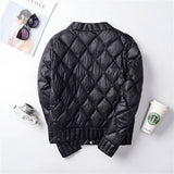 A pink women's lightweight quilted jacket featuring a diamond pattern design, displayed with a focus on the sleeve detail.