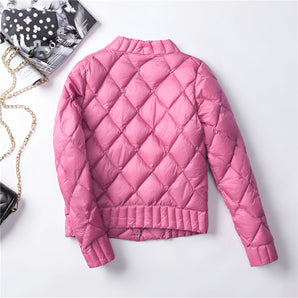 Pink women's lightweight quilted jacket with a diamond pattern, featuring long sleeves and a collar, shown in a pink and magenta color scheme.