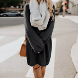 Pink wool coat for women in a knee-length design, featuring long sleeves and tailored shoulders.