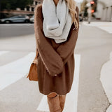 Women's knee-length brown wool coat with long sleeves and a classic collar, designed for winter fashion.