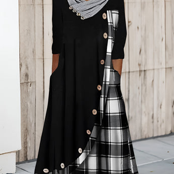 Plaid long-sleeve midi dress featuring a cowl neck and contrast hem, showcasing a stylish black and white design suitable for daytime fashion.