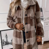 
A women's oversized brown plaid teddy coat displayed against a plain background, showcasing its thick, warm textile suitable for winter outerwear. The coat features a tartan pattern with shades of beige and white, offering a stylish and cozy fashion option.