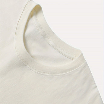 Plain white unisex T-shirt with short sleeves and a minimalist design.