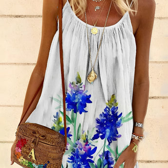 A lightweight sleeveless blue summer dress with a floral pattern, pleated design, suitable for beach wear, size 2XL.