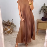 Pleated maxi dress in a taupe color featuring cap sleeves, a fitted waistline, and a flowing skirt designed for summer wear, shown in a large 3XL size.