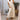 Pleated maxi dress in taupe with cap sleeves, designed for summer wear; shown in beige color and size 3XL, highlighting the dress's waist and shoulder details.