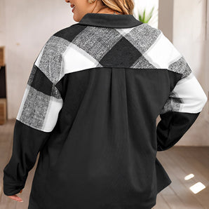 
A woman wearing a plus size black and white buffalo plaid oversized shirt, showcasing the relaxed fit and stylish design suitable for fall fashion.