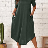 Dark green plus size loose fit midi dress featuring a casual and oversized design, highlighting the one-piece garment with short sleeves and a comfortable waistline, suitable for summer wear, displayed on a standing figure.